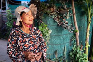 Lun Yi prepares for work in Kork Thlork, Siem Reap